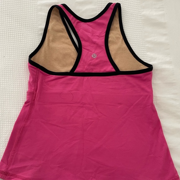 An assortment of Lululemon workout tops - Size 8 - Picture 6 of 8